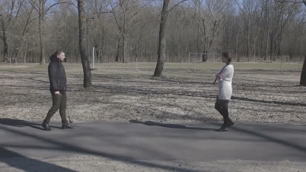 A loving couple walks by the river - Footage, Video