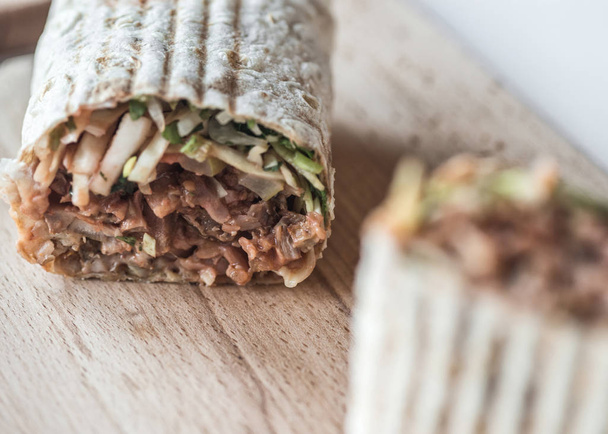 traditional oriental sandwich with meat, onion and herbs - Fotoğraf, Görsel