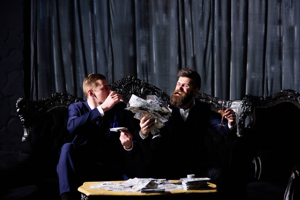Luxury life concept. Men in suit, businessmen sit - Fotografie, Obrázek