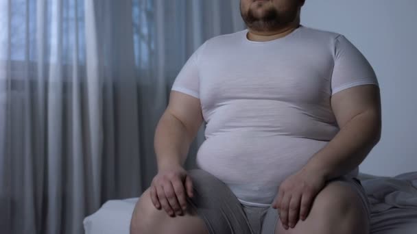 Obese male suffering from chest pain, high blood pressure, cholesterol level - Πλάνα, βίντεο