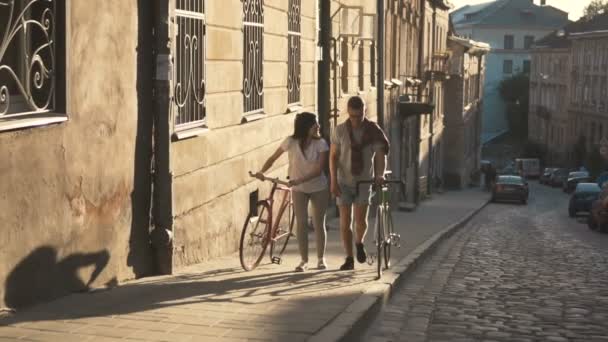 Friends Chat as Walking with Bikes - Filmati, video