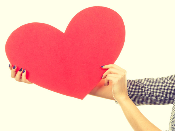 Valentines day, romance and relationship symbols concept. Woman holding big red heart, love sign. - Φωτογραφία, εικόνα