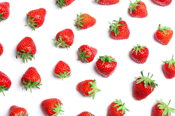 Composition with ripe red strawberries on light background - Foto, afbeelding