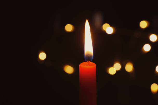 Wax candle burning on blurred background, closeup - Zdjęcie, obraz