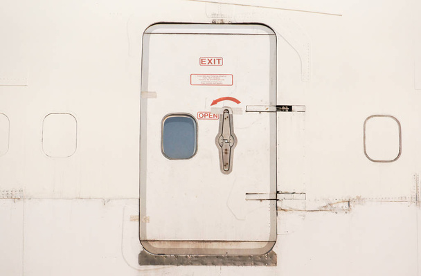 An aeroplane exit door - Photo, Image