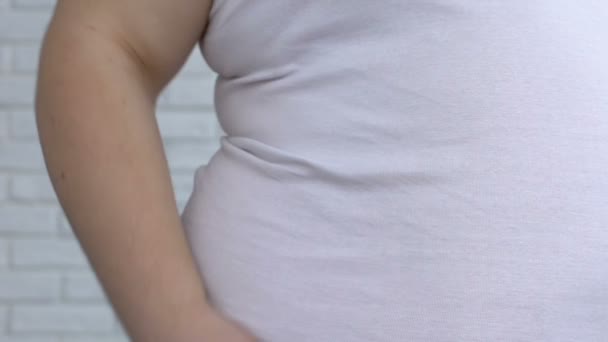 Obese male suffering from liver pain, digestive disorder, overeating disease - Imágenes, Vídeo