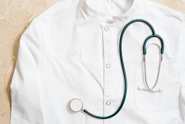 medical stethoscope on a gown - Foto, Imagen