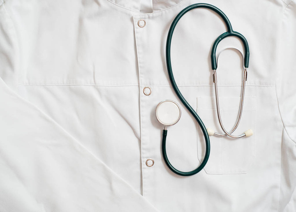 medical stethoscope on a gown - 写真・画像