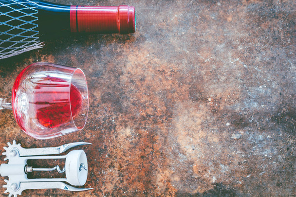 Bottle of wine, glass and corkscrew - 写真・画像
