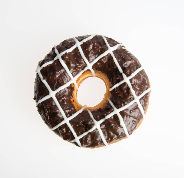 donut or chocolate donut on a background - 写真・画像