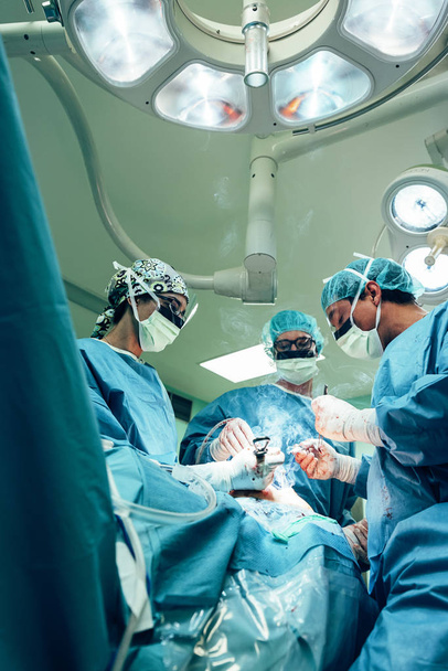 Team of Surgeons Operating in the Hospital. - Foto, Bild