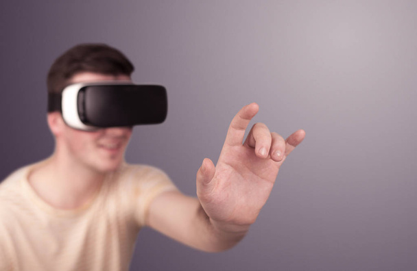 Man wearing virtual reality goggles - Foto, immagini