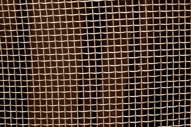 Металлическая сетка сетки рисунка коричневого тона. Абстрактный фон и текстура
. - Фото, изображение