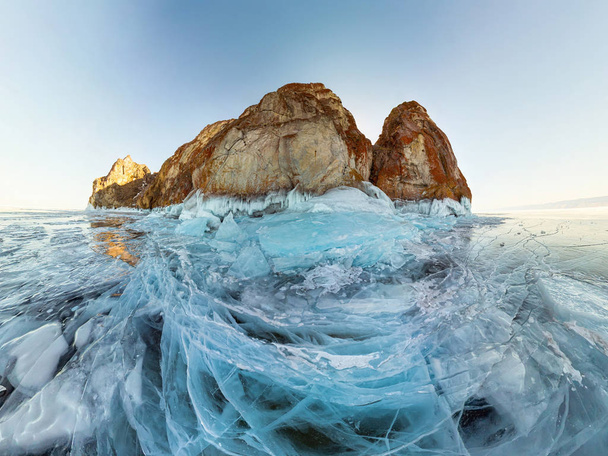 rock in the ice of Lake Baikal, the island of Olkhon. Panorama landscape, abstraction. - Photo, image