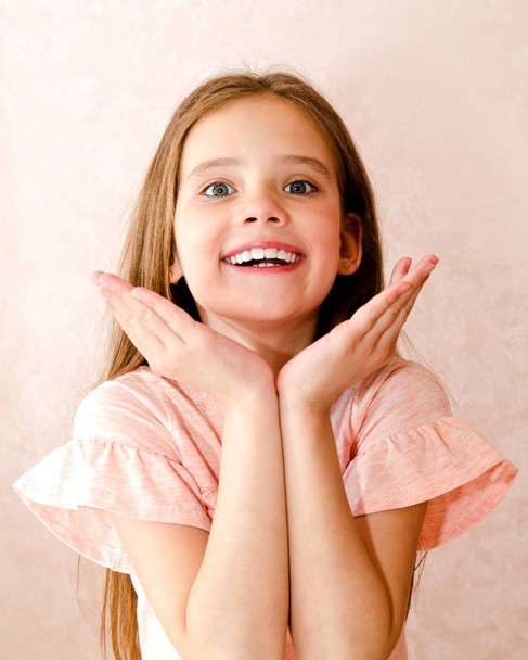 Portrait of adorable smiling little girl child isolated - Φωτογραφία, εικόνα