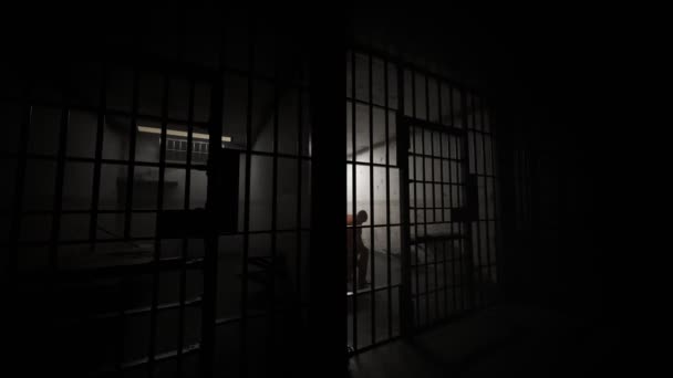 Criminale depresso seduto dietro le sbarre nella vecchia cella del grunge
. - Filmati, video