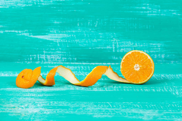 orange fruit on color table background. - Фото, изображение