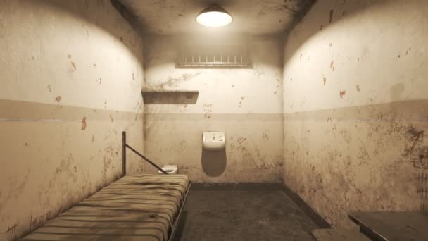 Animazione di una singola vecchia cella chiusa a chiave vista attraverso le sbarre della prigione. Macchina fotografica si muove attraverso le barre
. - Filmati, video
