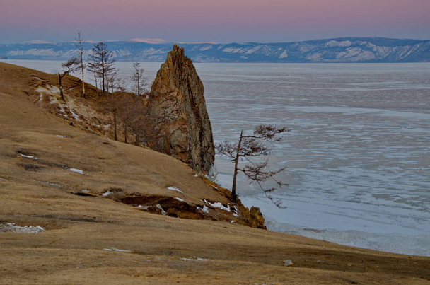Russia. The Lake Baikal. Dawn on Cape Burhan of Olkhon island. - Φωτογραφία, εικόνα