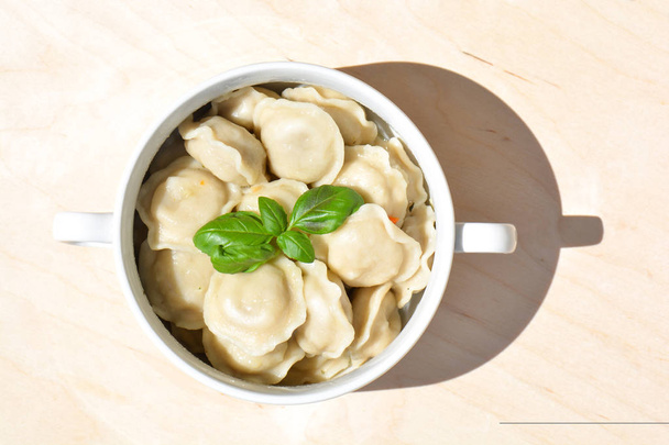 Meat dumplings with spices. Russian classic dumplings. Traditional Russian food - Photo, image