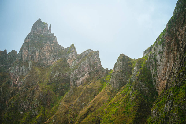 Sharp stand out mountain ridge overgrown with verdant grass. Xo-Xo Valley. Santo Antao Island, Cape Verde Cabo Verde. - Foto, Imagen