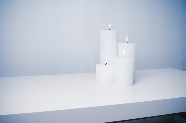 Four white candles burning - Φωτογραφία, εικόνα