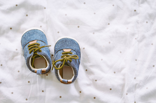 Baby shoes on blanket - Photo, Image