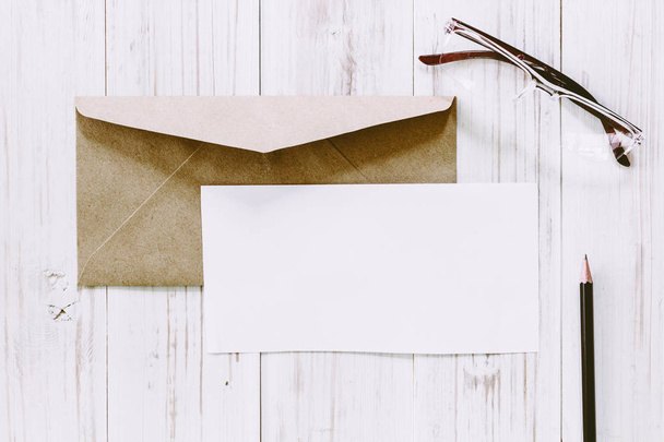 A envelope on wooden background - Photo, Image