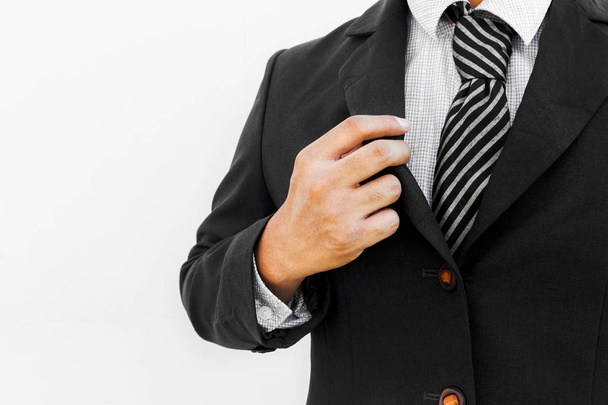 Businessman adjust necktie before start to the office - Photo, Image