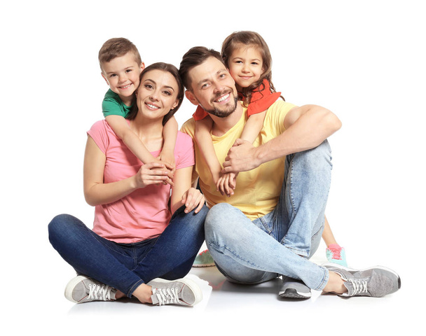 Happy family with cute children on white background - Foto, Imagen
