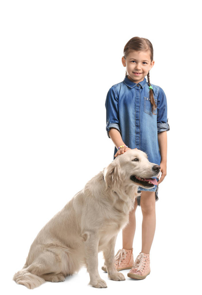 Cute little child with his pet on white background - Foto, Imagen