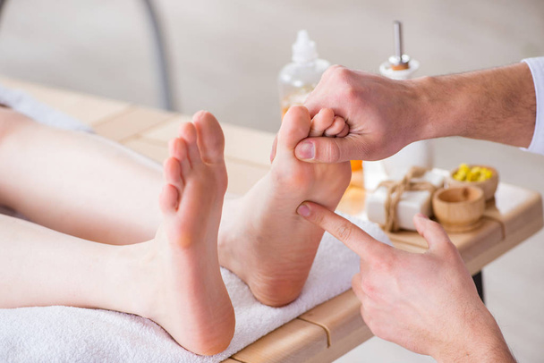Foot massage in medical spa - Photo, Image