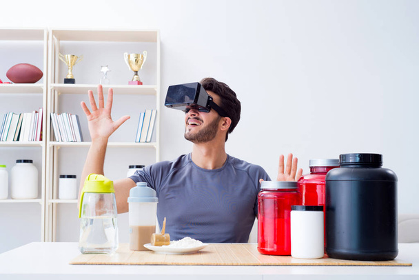 Homem com frascos de nutrição e óculos de realidade virtual - Foto, Imagem