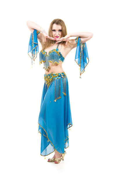 Attractive girl dancing belly dancer on isolated white background. - Photo, Image