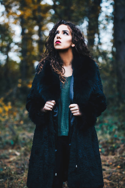 photo of tender curly brunette woman outdoor - Valokuva, kuva