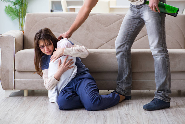 Domestic violence concept with drinking husband man - Zdjęcie, obraz