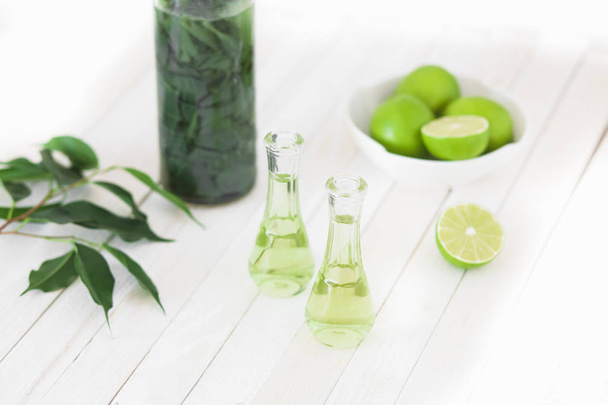 Herbal brandy with healty leafs and lime - Foto, Imagem