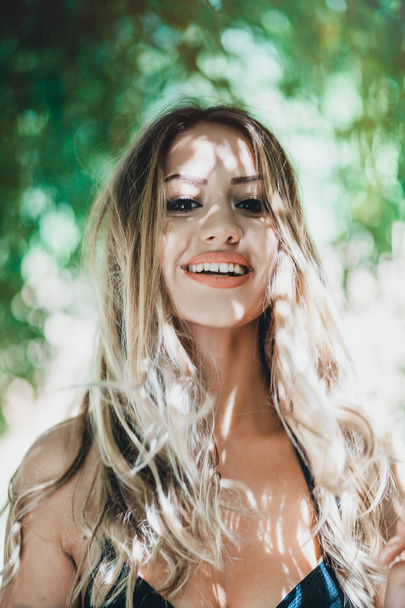 Sensual portrait of young blonde woman posing outdoors - Fotografie, Obrázek