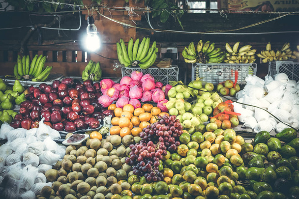 Variety of fresh fruits on organic food night market. Bali island, Indonesia. - Fotó, kép