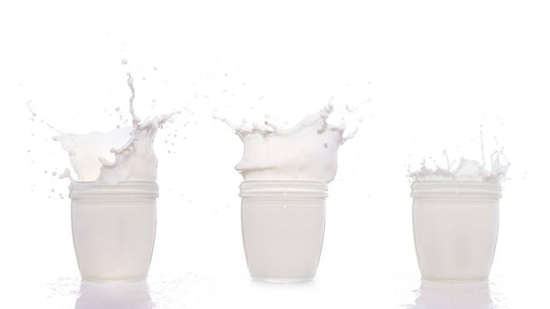 close up three glass milk splash isolated on white background - Foto, Imagem