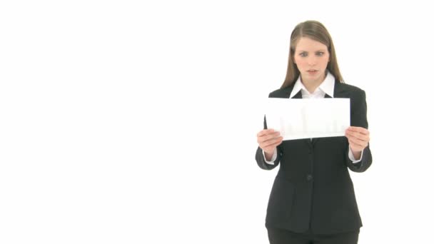 Woman breaks paper - Materiał filmowy, wideo