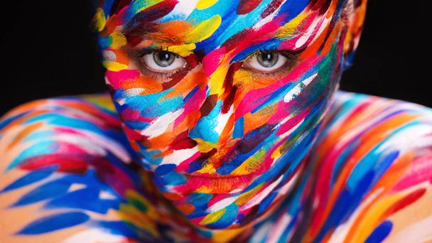 Portrait of the bright beautiful girl with art colorful make-up and bodyart - Фото, зображення