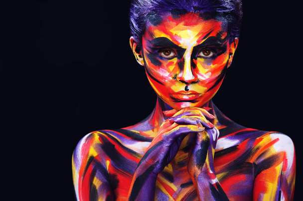 Portrait of the bright beautiful girl with art colorful make-up and bodyart - Фото, изображение