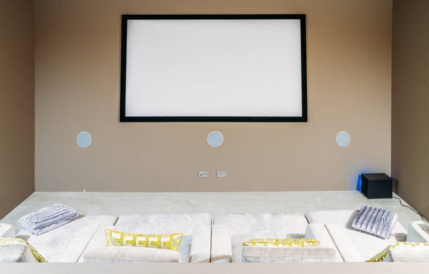 Home cinema with comfortable sofa couches in luxury home - Photo, Image