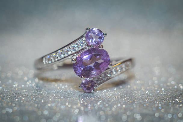 Fashion silver ring decorated with natural amethyst gemstone. - Photo, Image