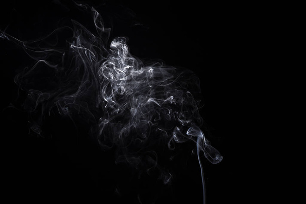 Rokerige golven van branden aromastick - Foto, afbeelding