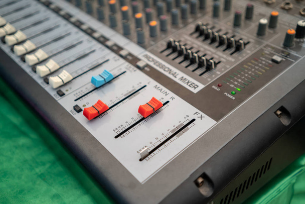 Close up of music mixer equalizer console for mixer control sound device. Sound technician audio mixer equalizer control for background. - Photo, Image