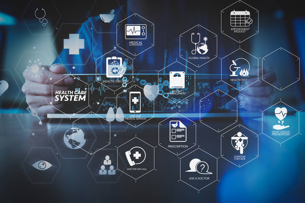 健康チェックと Vr dashboard.smart 医師手仮想アイコン ダイアグラムと近代的なオフィスに現代のラップトップ コンピューターで作業の症状医療システム図 - 写真・画像