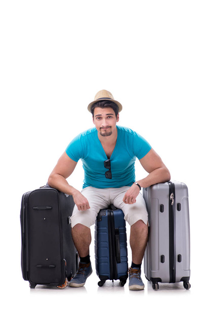 Reiziger met veel bagage geïsoleerd op witte achtergrond - Foto, afbeelding