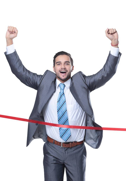 triumphant businessman in front of the starting tape - Фото, изображение